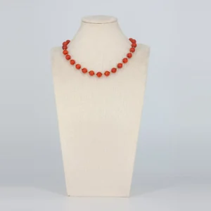 Orange Halskette mit goldfarbenen Details von Senai Jewels, handgefertigt in Zürich